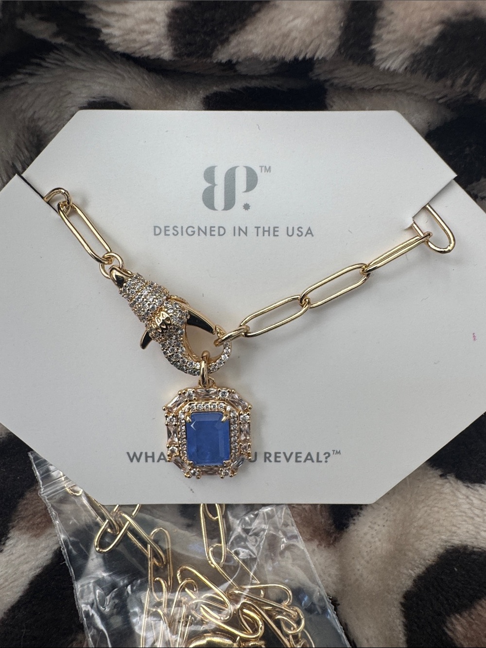 bp Gold-Tone Dolphin Charm Necklace with Blue Stone Pendant